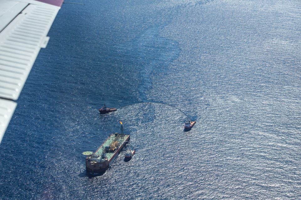 Photography from a light aircraft on 11th October shows oil emanating from the Farwah oil platform away from support vessels. Credit: Jens Scheibe