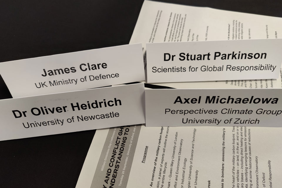 Name cards from the participants for session one of the conference showing the diverse backgrounds of the speakers - academia, civil society and the military.
