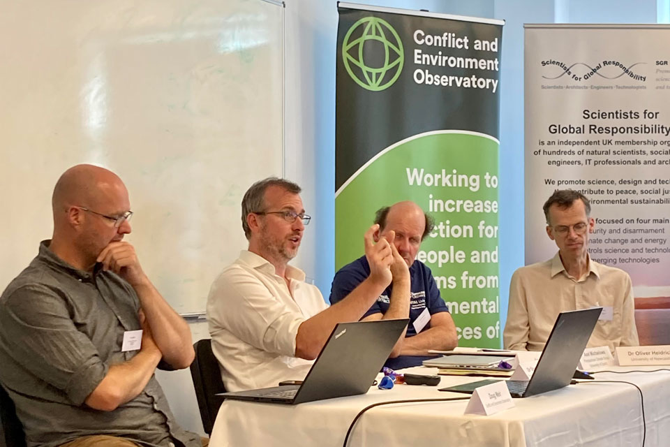 Panel 2 of the 2023 military emissions gap conference featuring, left to right, Doug Weir, James Clare, Oliver Heidrich and Axel Michaelowa.