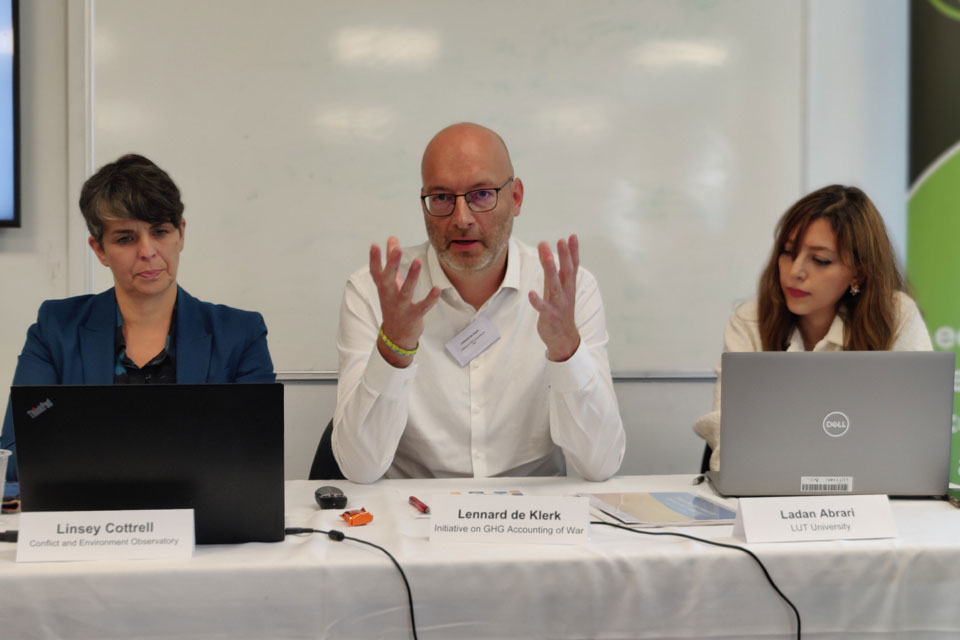 Panel 3 of the 2023 military emissions gap conference, featuring left to right, Linsey Cottrell, Lennard de Klerk and Ladan Abrari.