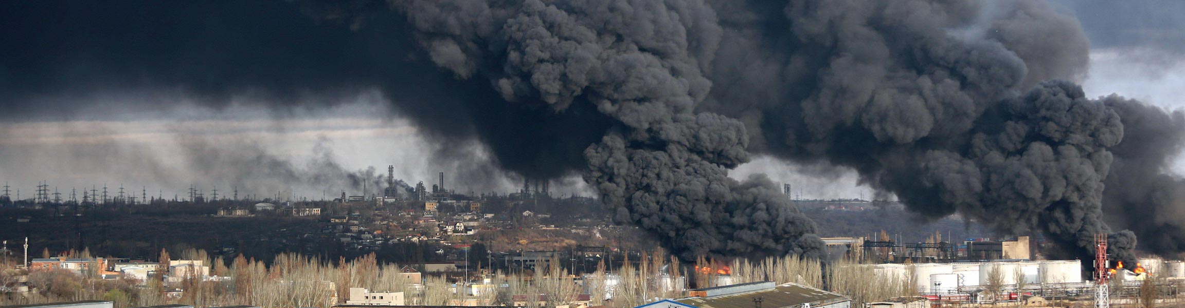 Smoke rising across two oil storage depots struck by a Russian attack in Ukraine in 2022.
