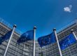 European Union flags outside a building